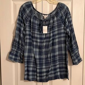 Large JM Sportswear top. Never worn still has tag on it from Cato.